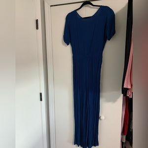 Forever 21 blue jumpsuit. NWT. Size small.